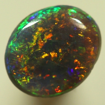 SOLID SEMI BLACK OPAL Pinfire pattern. Sparkling bright fire.